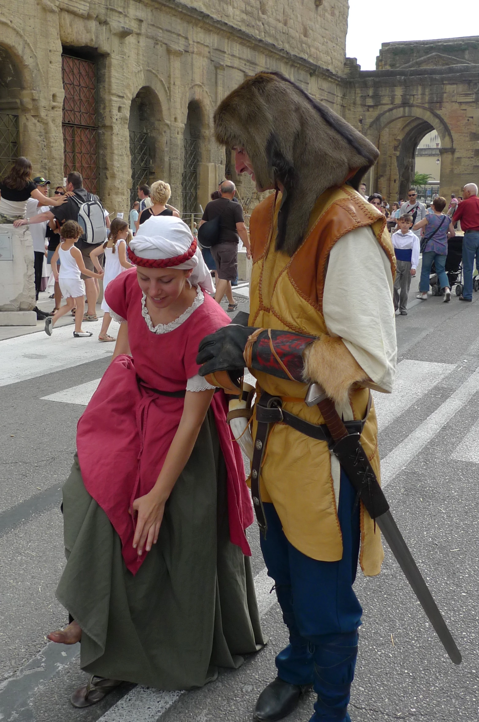 a man and woman dressed as medieval knights