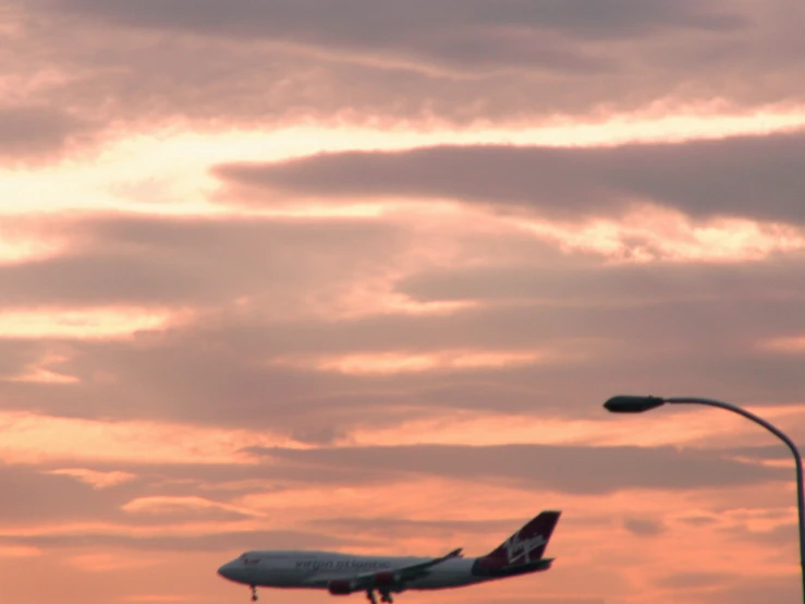 the airplane is about to land on the airport runway