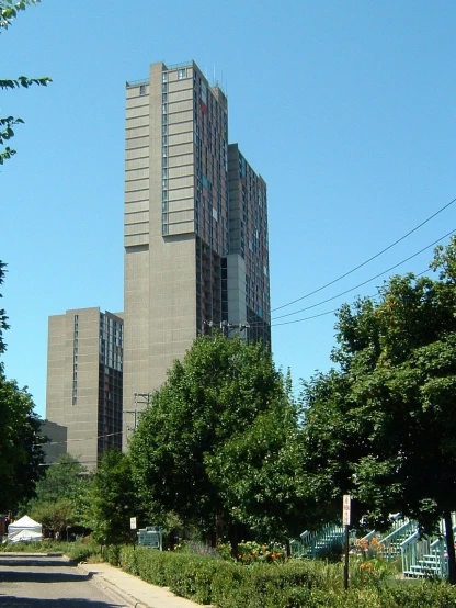 the tall building has many windows at the top