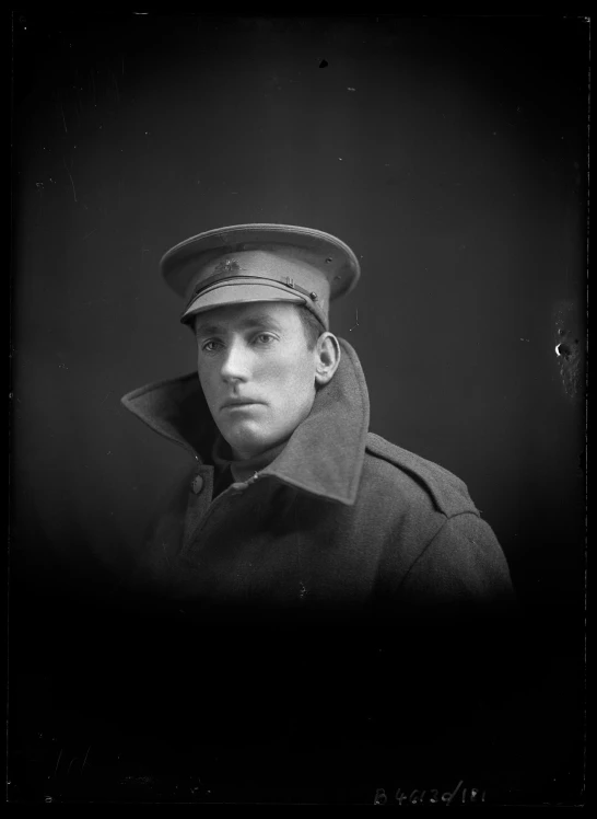 an image of a man wearing a uniform and hat