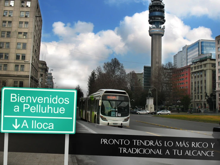 a bus driving down the road next to a tower