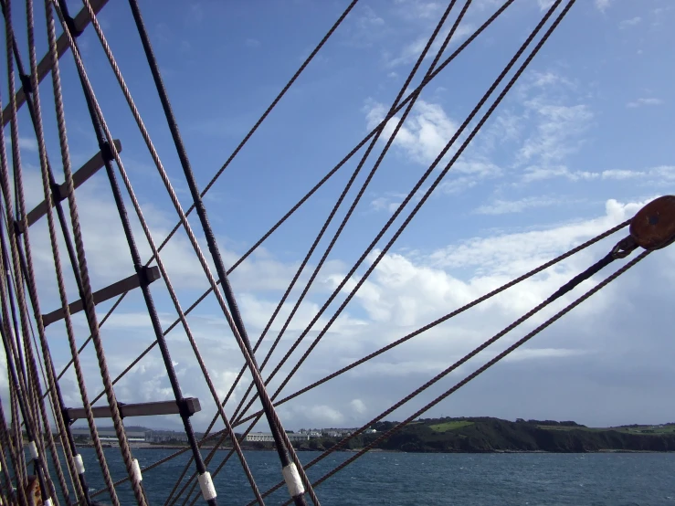 view from a sailing ship looking at the ropes