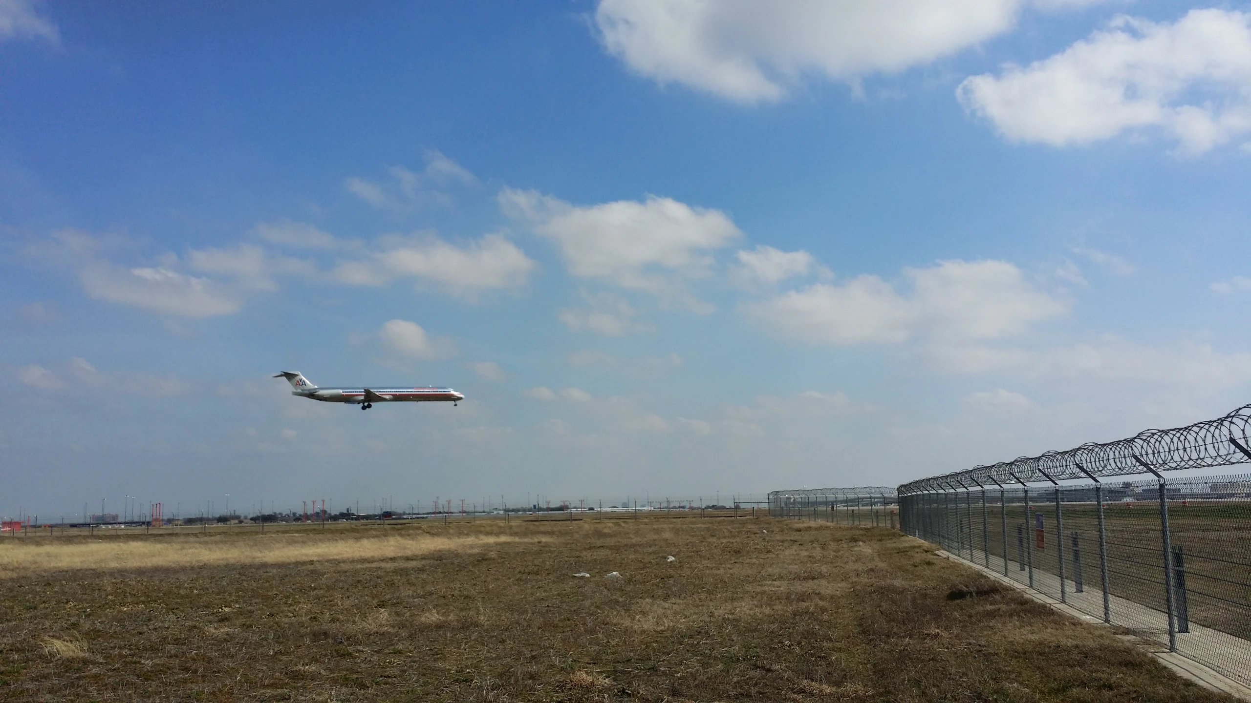 there is a airplane that flies low to the ground