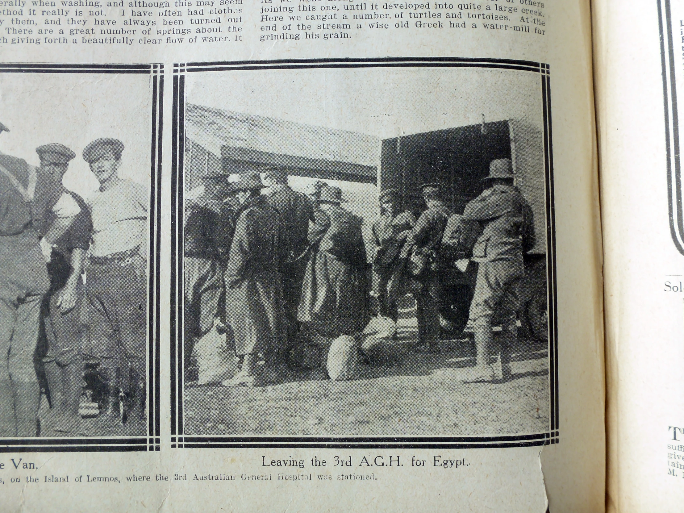 a book open on the page with pictures of men and children outside