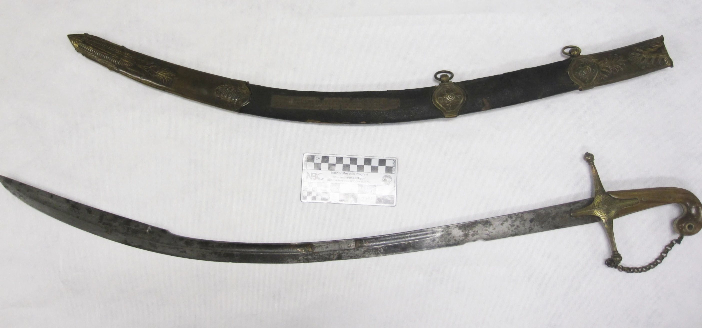 two different type of swords, with a few missing pieces