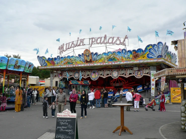 several people stand on either side of an amut area