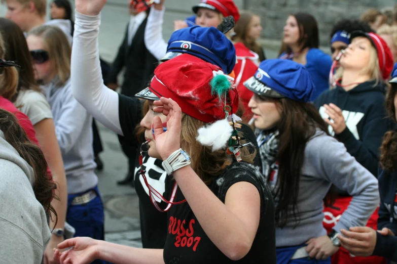 a group of people with many dressed up