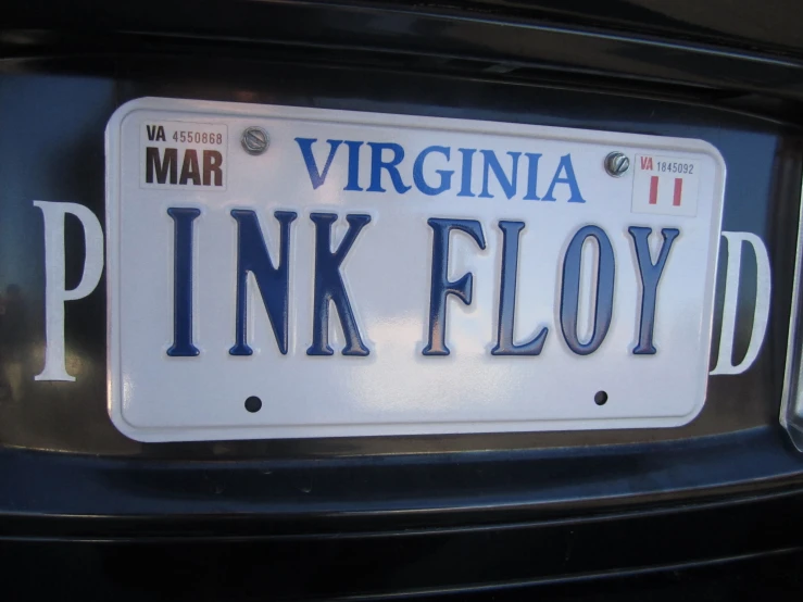 pink floyd license plate on a car parked