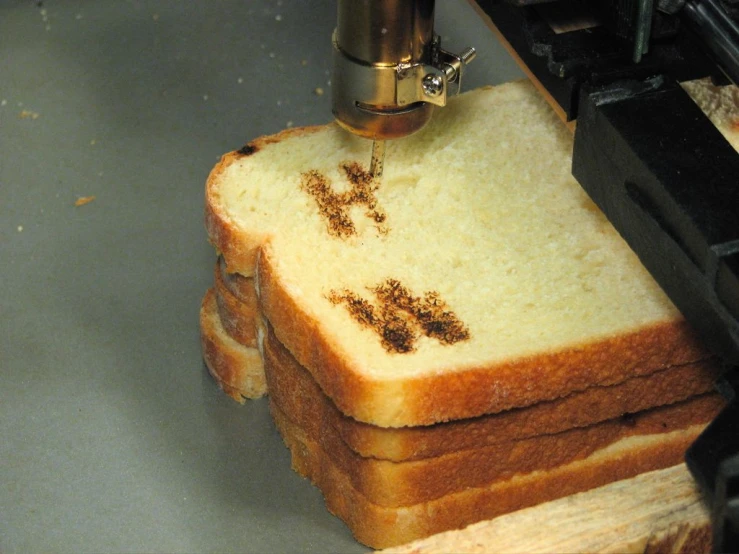 two slices of toast on a metal surface