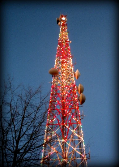 a tower with lights that are on it