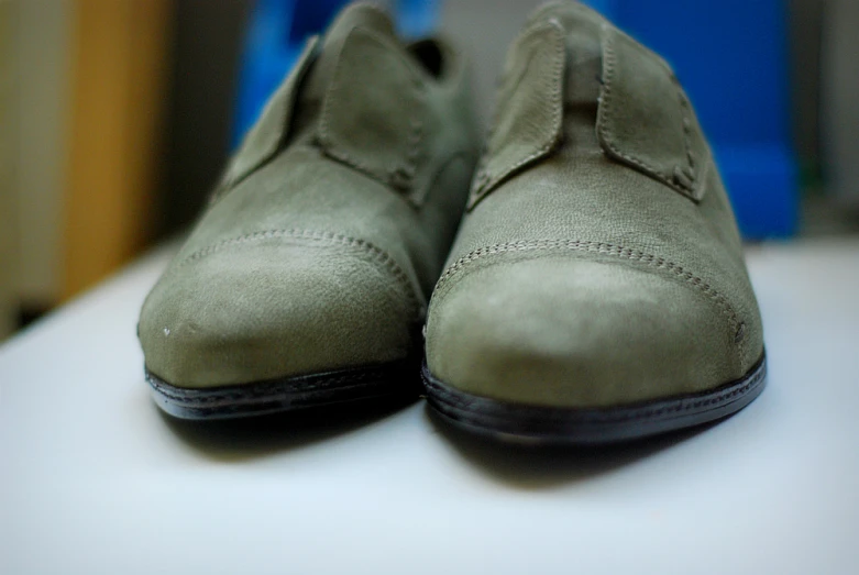 a pair of shoes sitting on top of a table