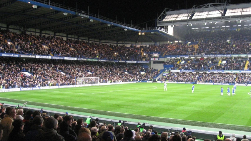 a soccer game is being played in an empty stadium