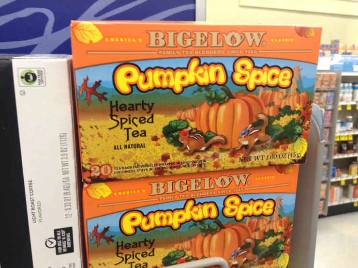 three bags of pumpkin spice sitting on top of each other