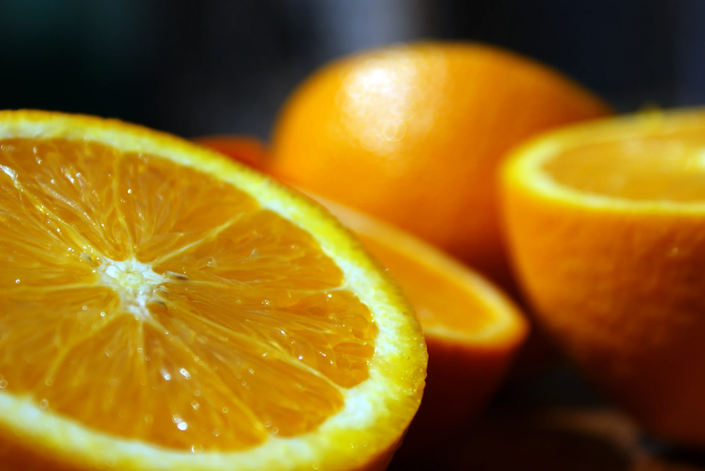 a picture of some oranges sliced in half