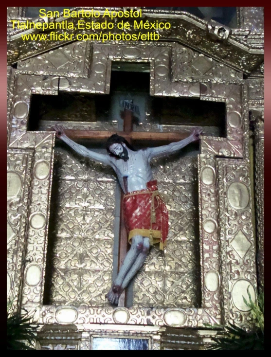 a po taken of a crucifix inside a building