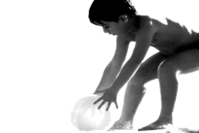 a young man with  holding a frisbee