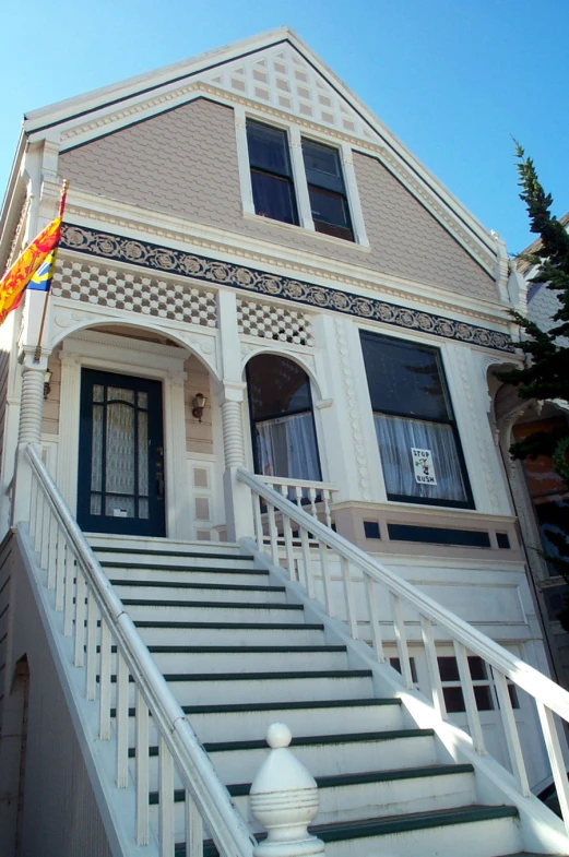 a white house with some steps leading up to it