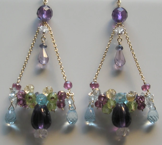 a pair of multicolored crystal dangling earrings