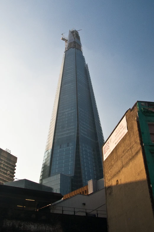 a tall building with many windows in the sky