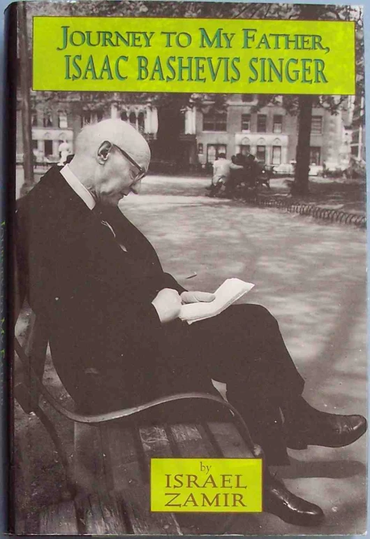 a man in a suit is sitting on a bench