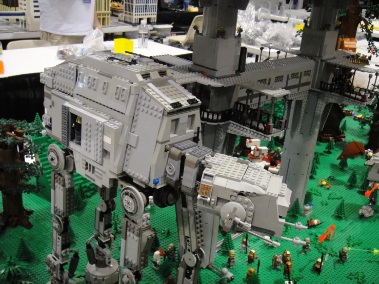 a lego star wars at at is model in an office