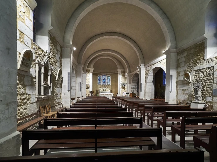 an image of a church filled with pews