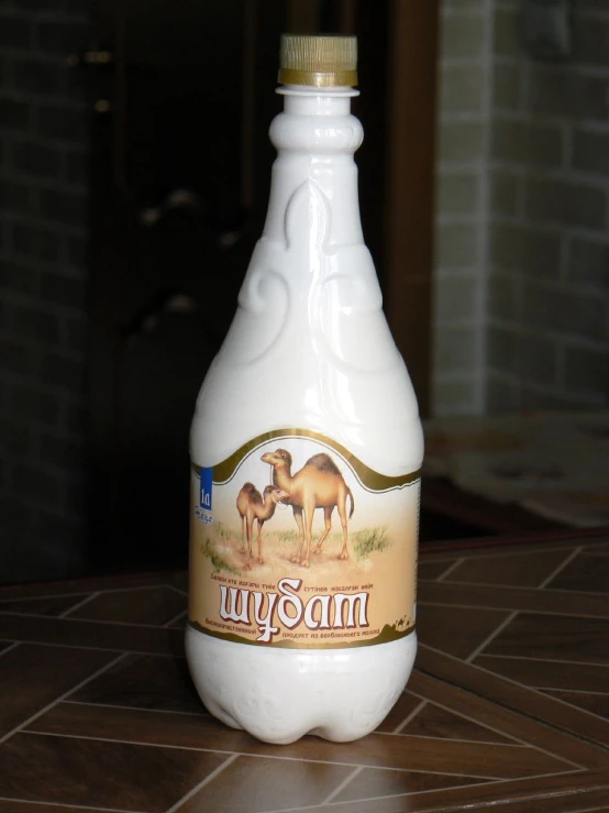 a bottle of moroccan on a tile countertop