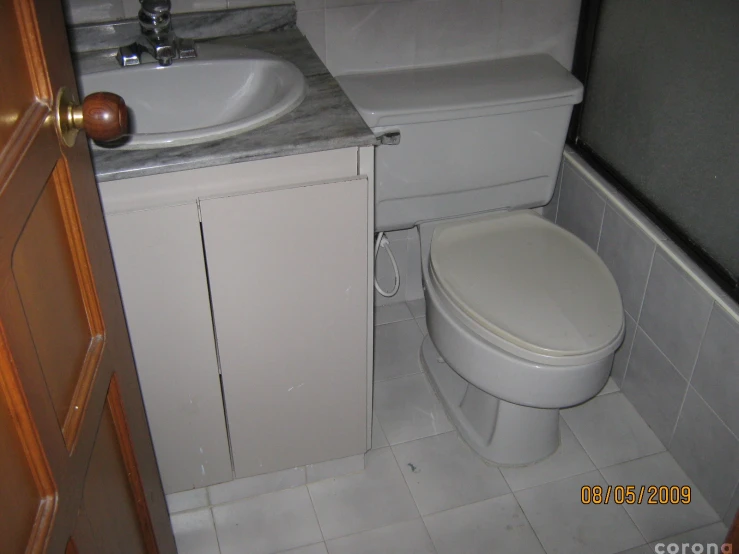 the small bathroom is very clean and white