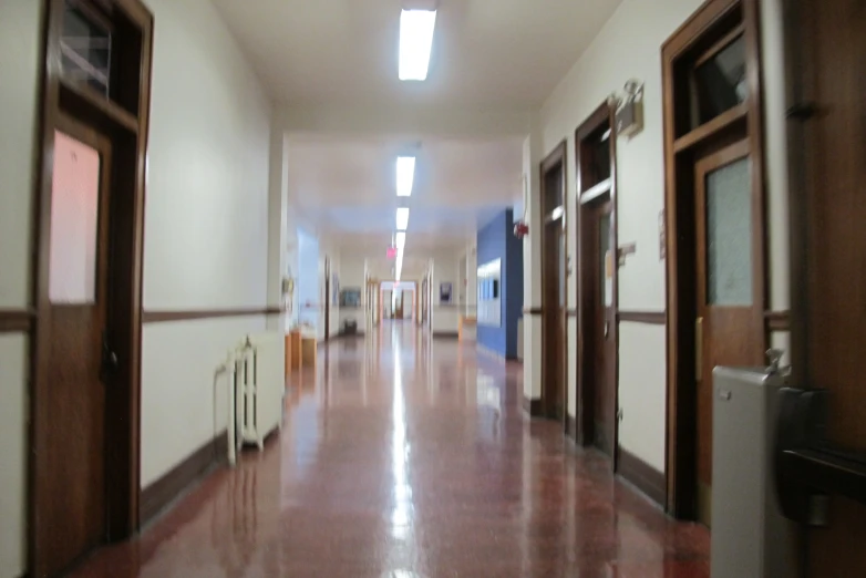 the hallway is empty in an apartment building