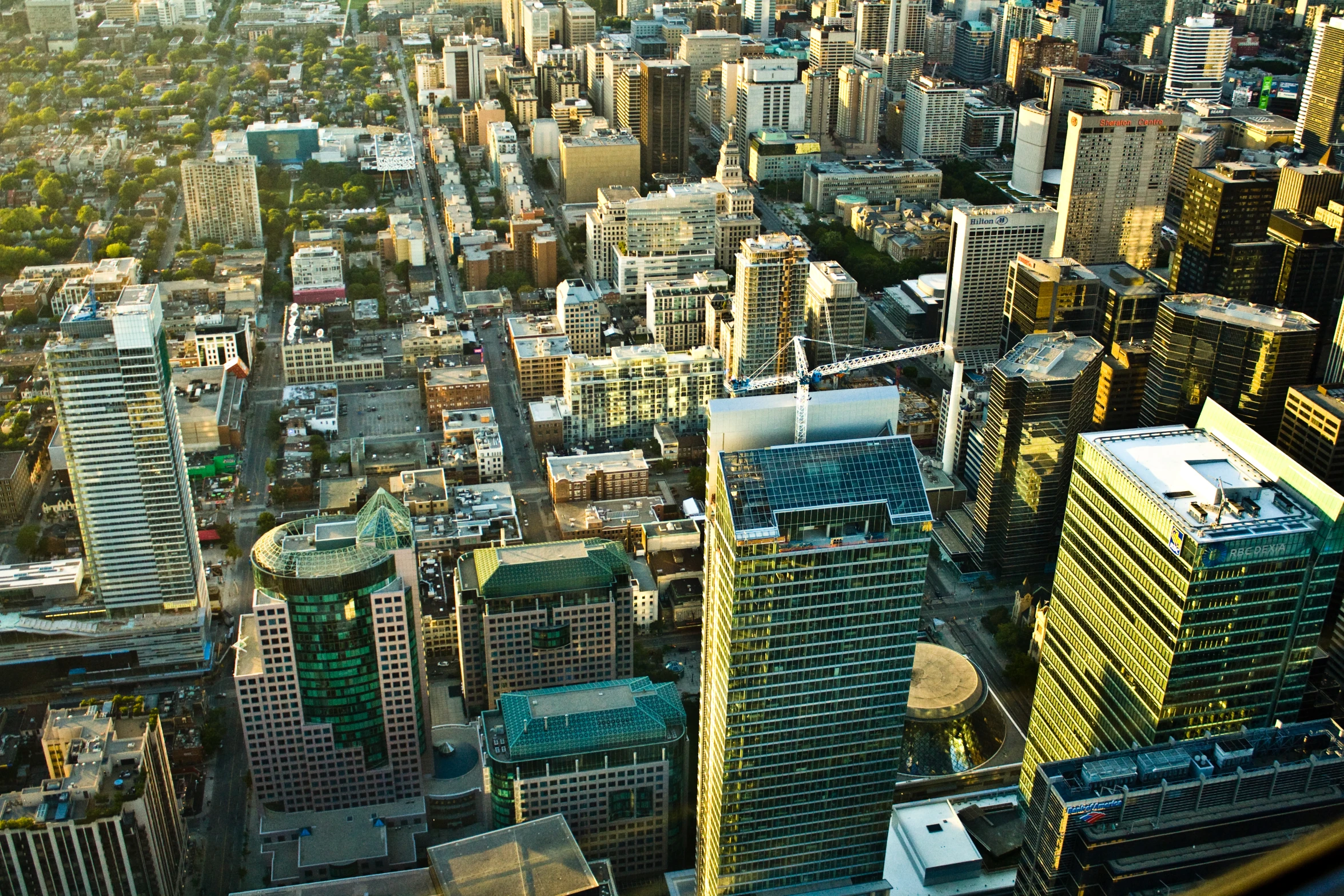 a large city is shown in the middle of a sunset