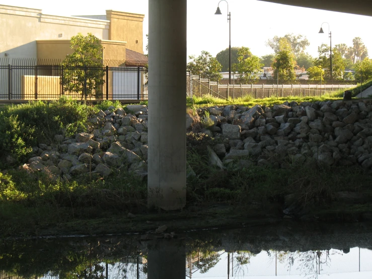 an over head view of the building and the reflection of water