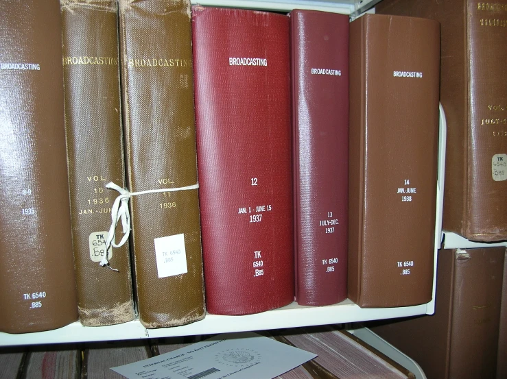 a row of books with many different cases