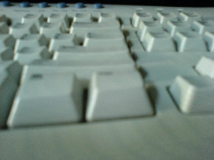 the close up view of a white keyboard