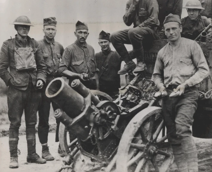 a group of soldiers pose for a picture