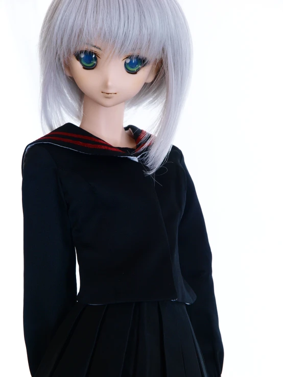 a doll wearing a dress with a white hair