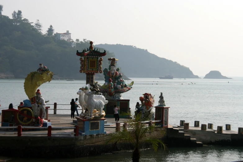 an elaborate float at the edge of a body of water