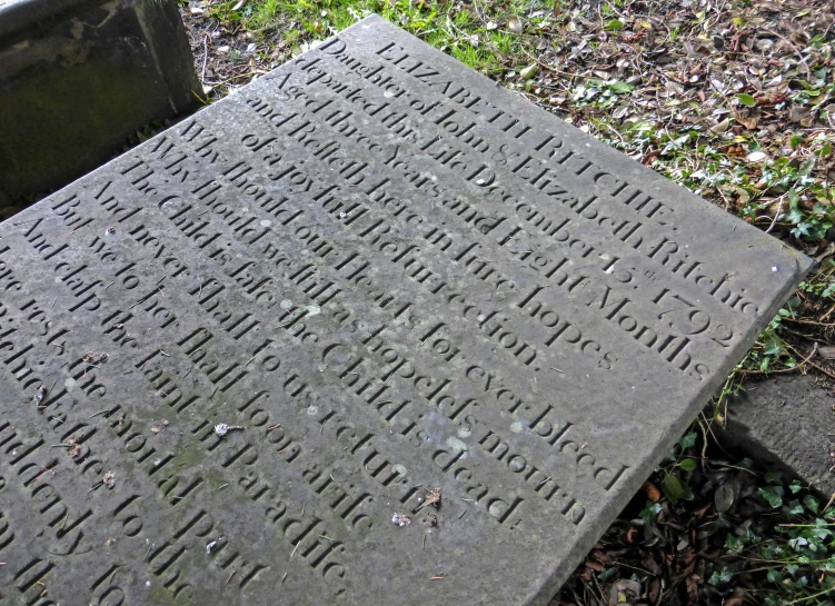 a couple of cement steps leading to a grave