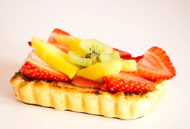 a piece of pastry with fruit on top