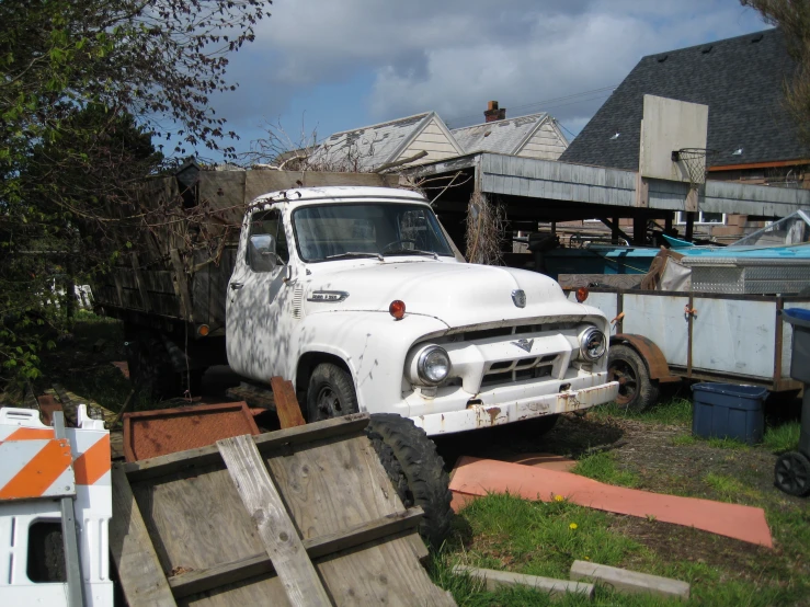 a large truck is parked in the yard