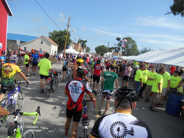 a group of bikers are in line to race