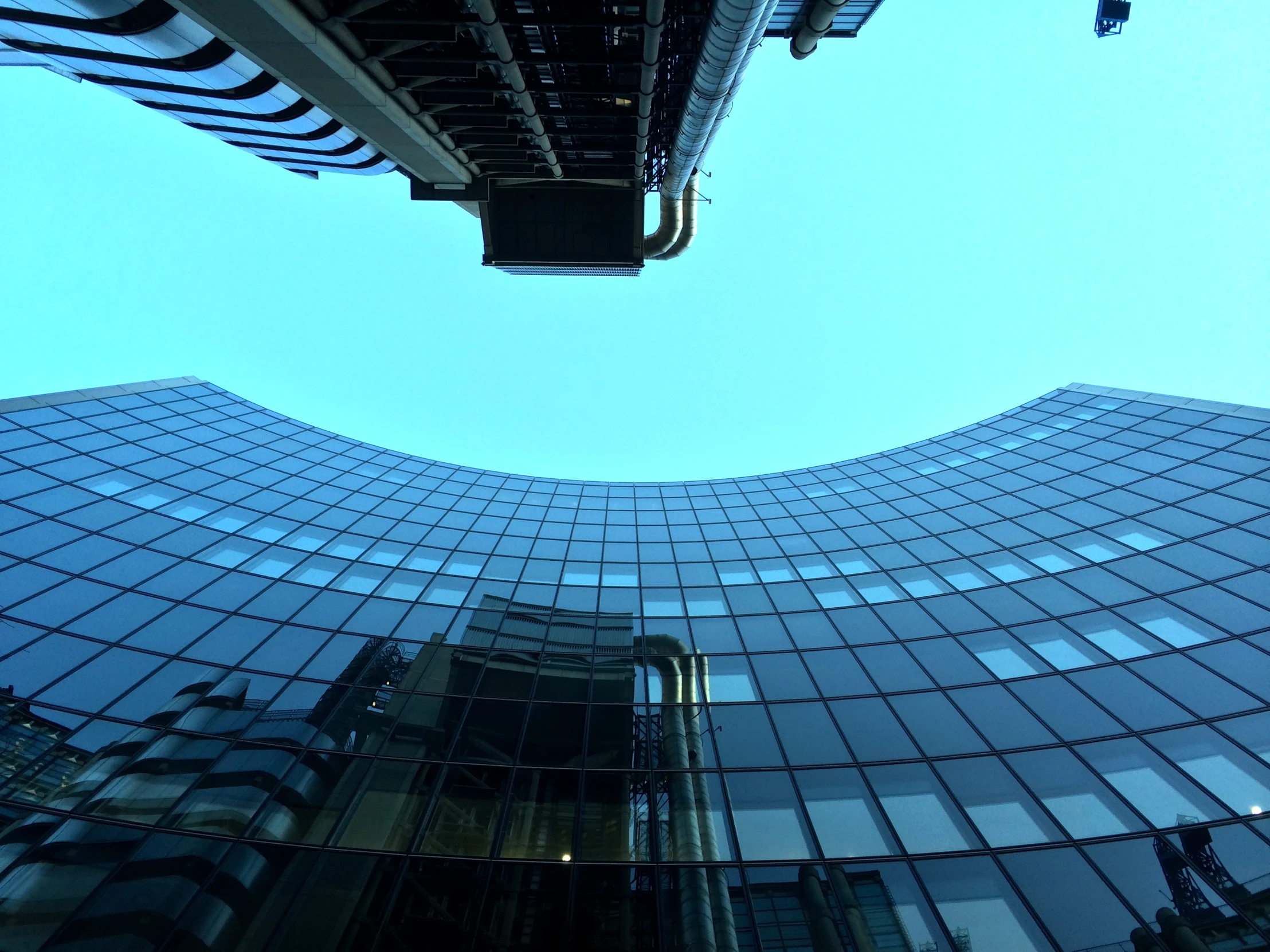 a tall building has a very high pointy perspective