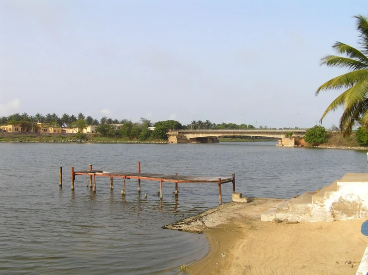 a body of water with a dock next to it