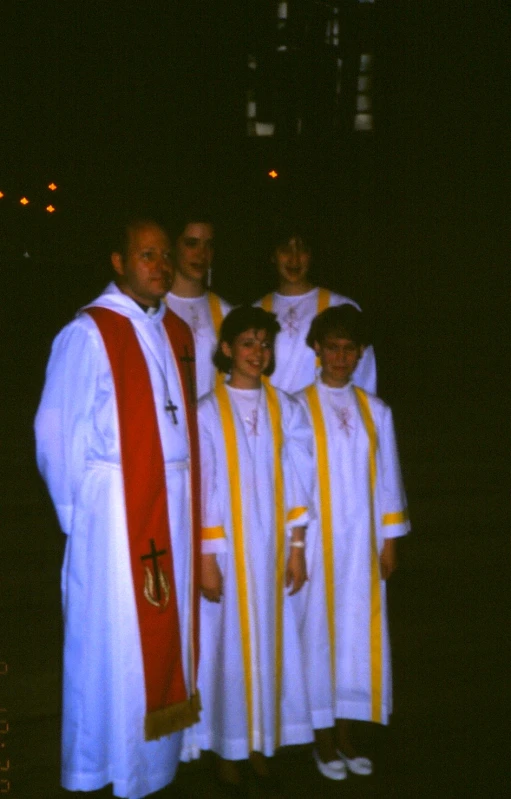 a group of priests standing next to each other