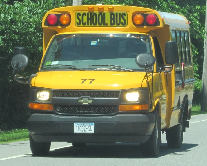 a school bus driving down the street