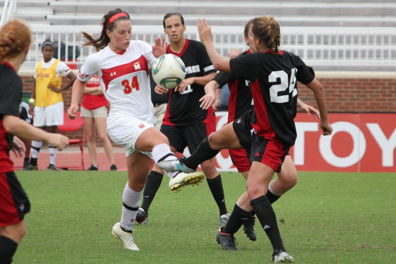 a group of people playing a game of soccer