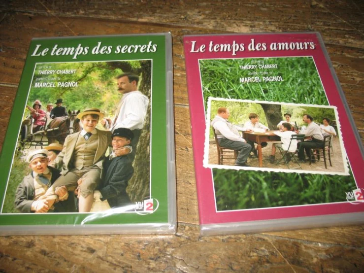 two french paperback books, each containing two story novels
