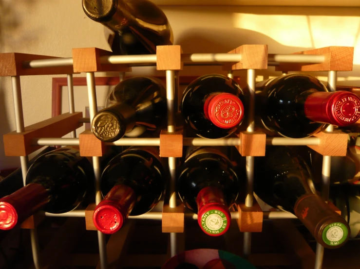 a wine rack with many bottles of wine on it