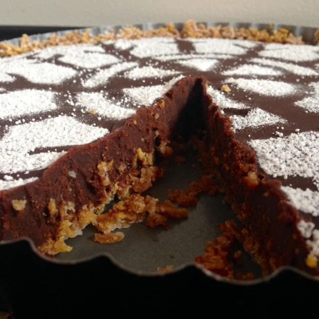 a chocolate cake has been cut out to be eaten