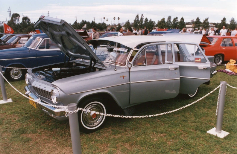 old cars on display with some being serviced