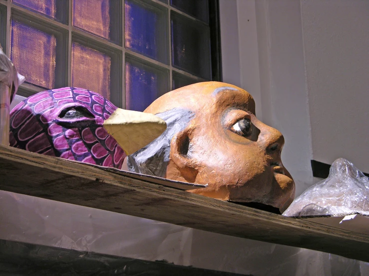 a close up of a sculpture of a dog